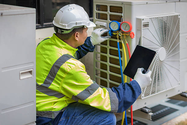 Professional Air Conditioning Repair technician working in College Station, TX